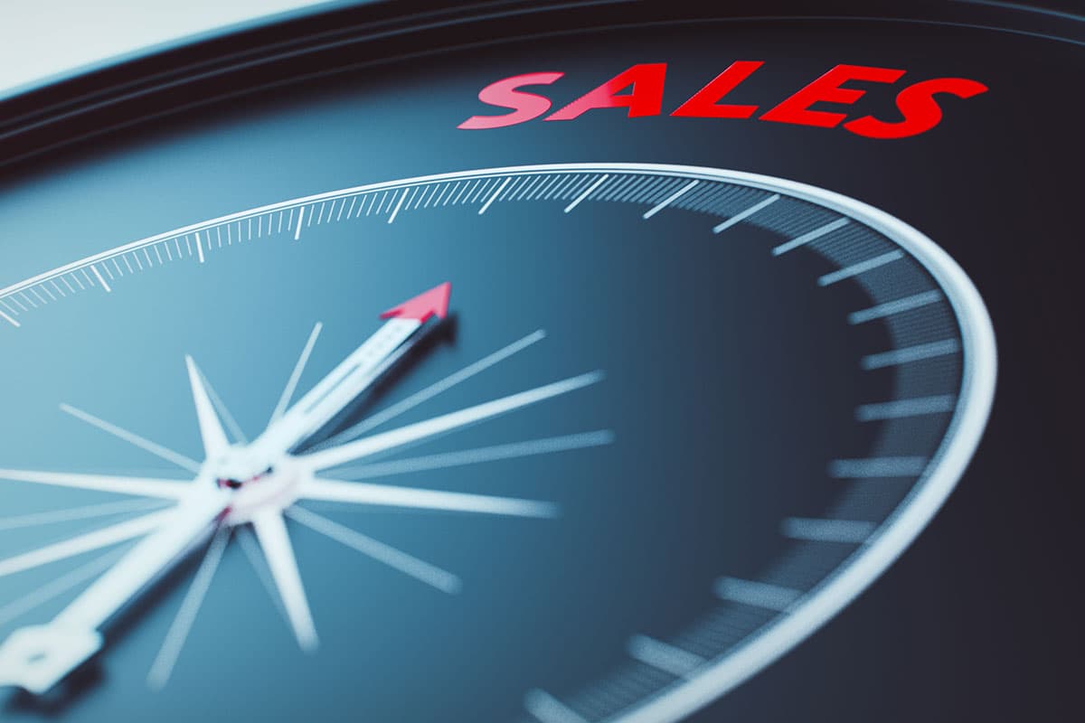Kompass zeigt auf Sales