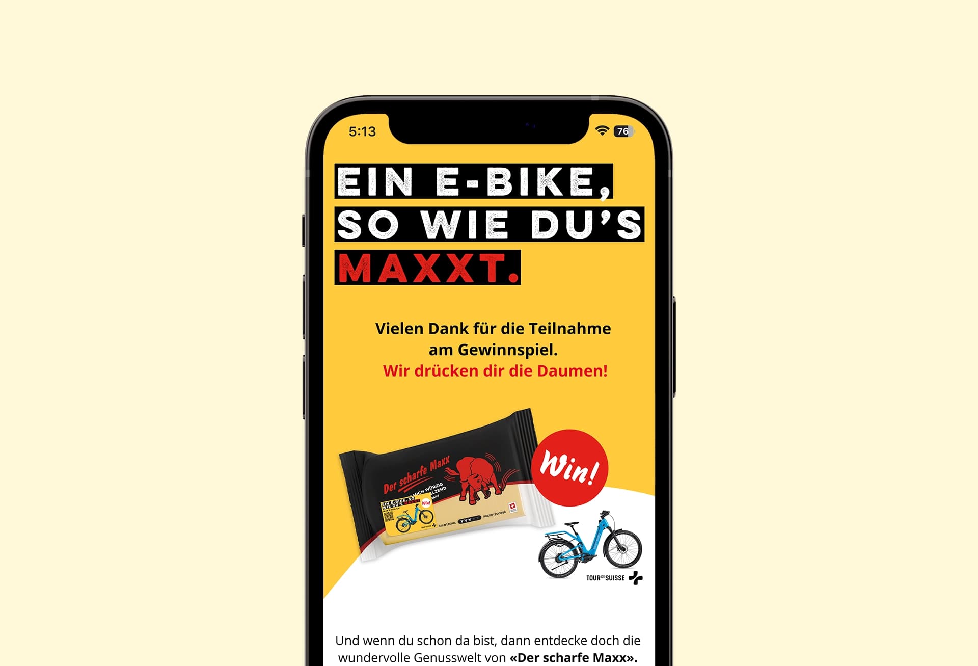 Auf einem Smartphone-Display wird eine Gewinnspiel-Seite für „Scharfer Maxx“ angezeigt. Die Nachricht bedankt sich für die Teilnahme und zeigt das Produkt und ein E-Bike. Die Seite drückt den Teilnehmern die Daumen.